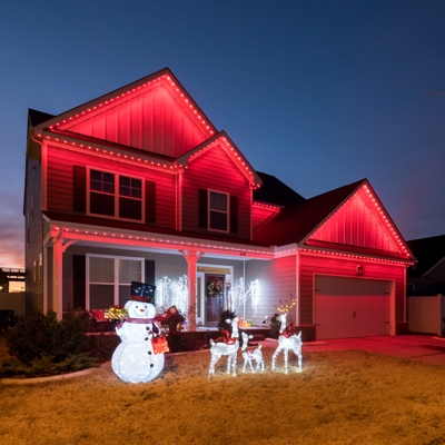 These Spring colors on permanent roofline lighting make it festive year-round. Photo